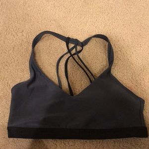 Black and grey under armour sports bra